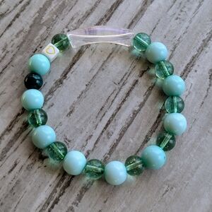 St. Patrick's Day green and teal beaded stretch bracelet